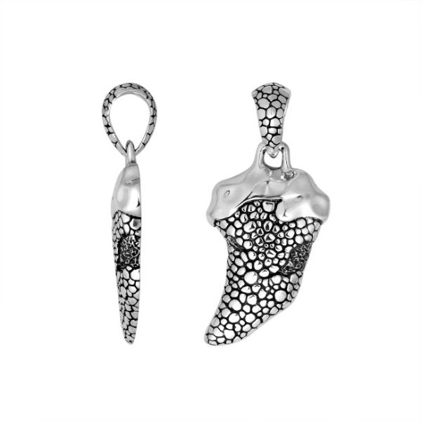Artistic sterling silver claw pendant with pebble textured detailing.