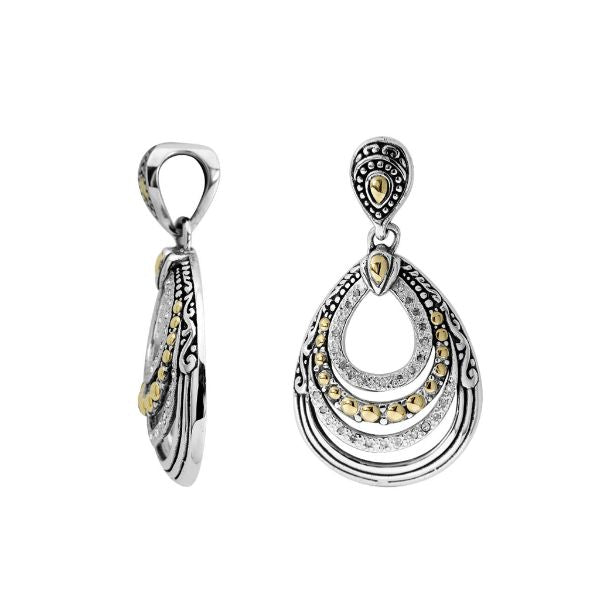 Artistic teardrop silver pendant with gold and diamond accents