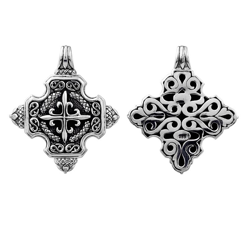 A handcrafted sterling silver fancy cross pendant featuring ornate Balinese scrollwork, oxidized antique textures, polished overlay details, and expressive artisan craftsmanship ideal for elegant everyday wear.