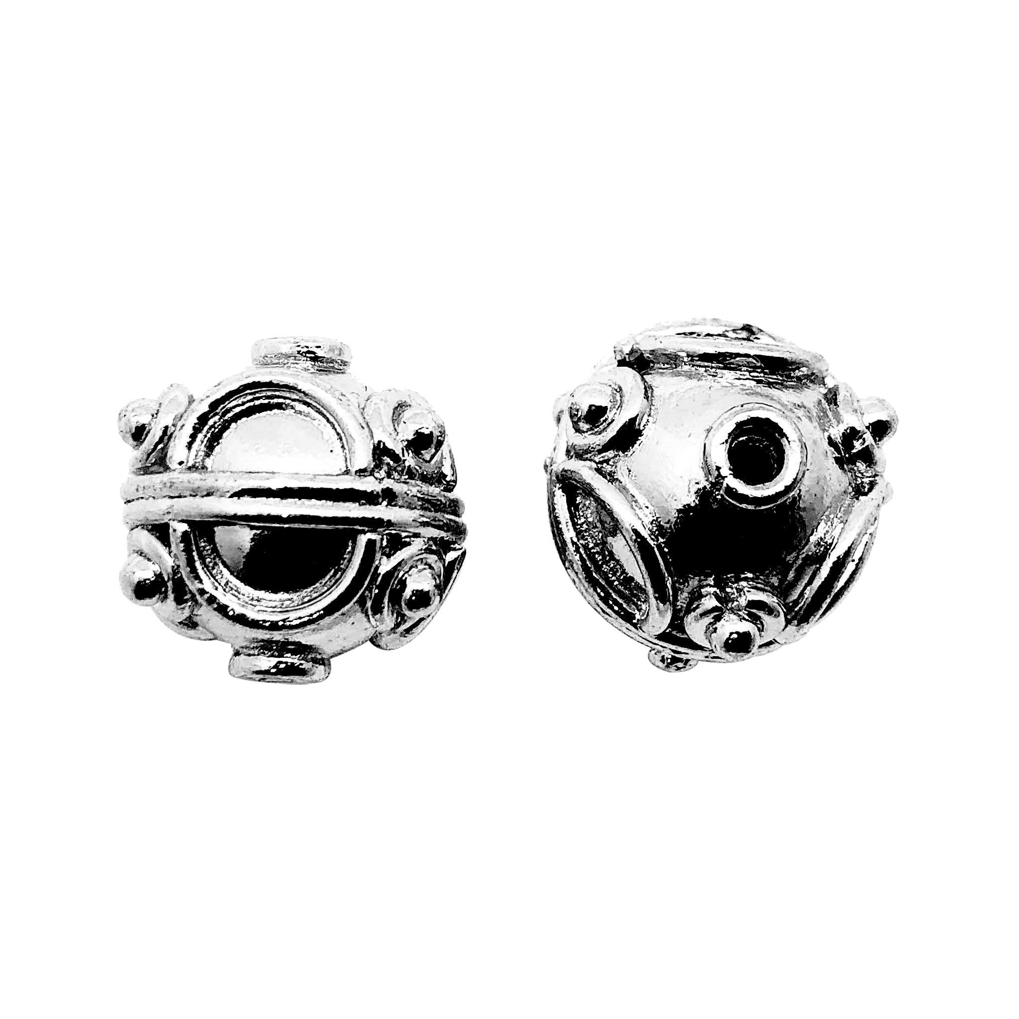 Handcrafted black rhodium overlay filigree bead over copper with spherical shape made in India.
