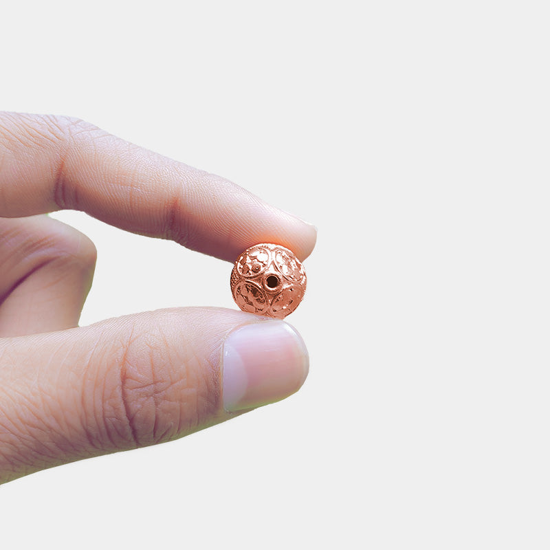Decorative rose gold overlay copper filigree bead handcrafted in India for jewelry designs