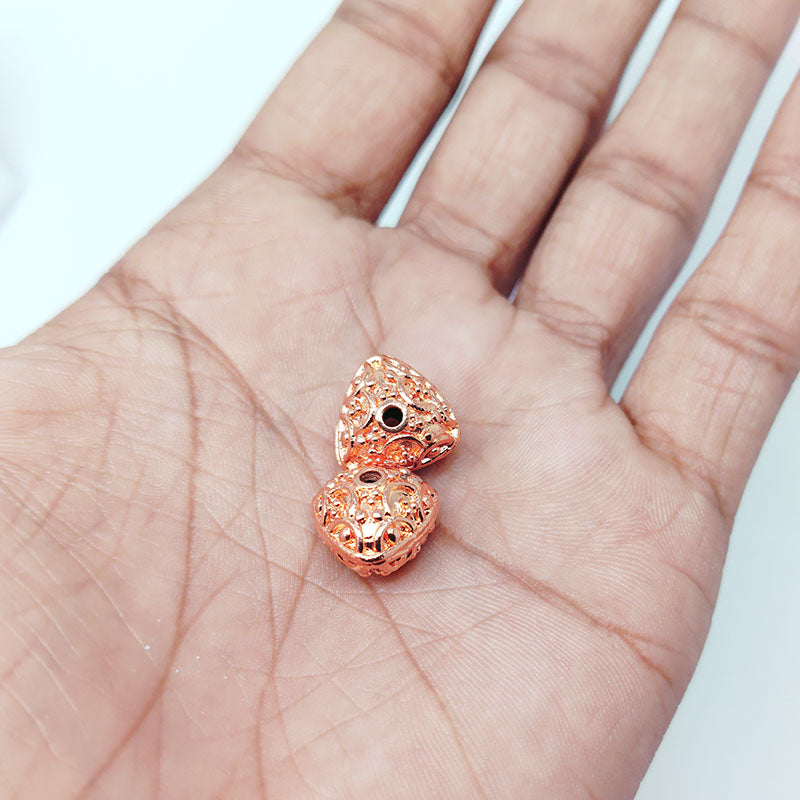 Rose Gold handcrafted round jewelry bead from India with decorative circular detailing