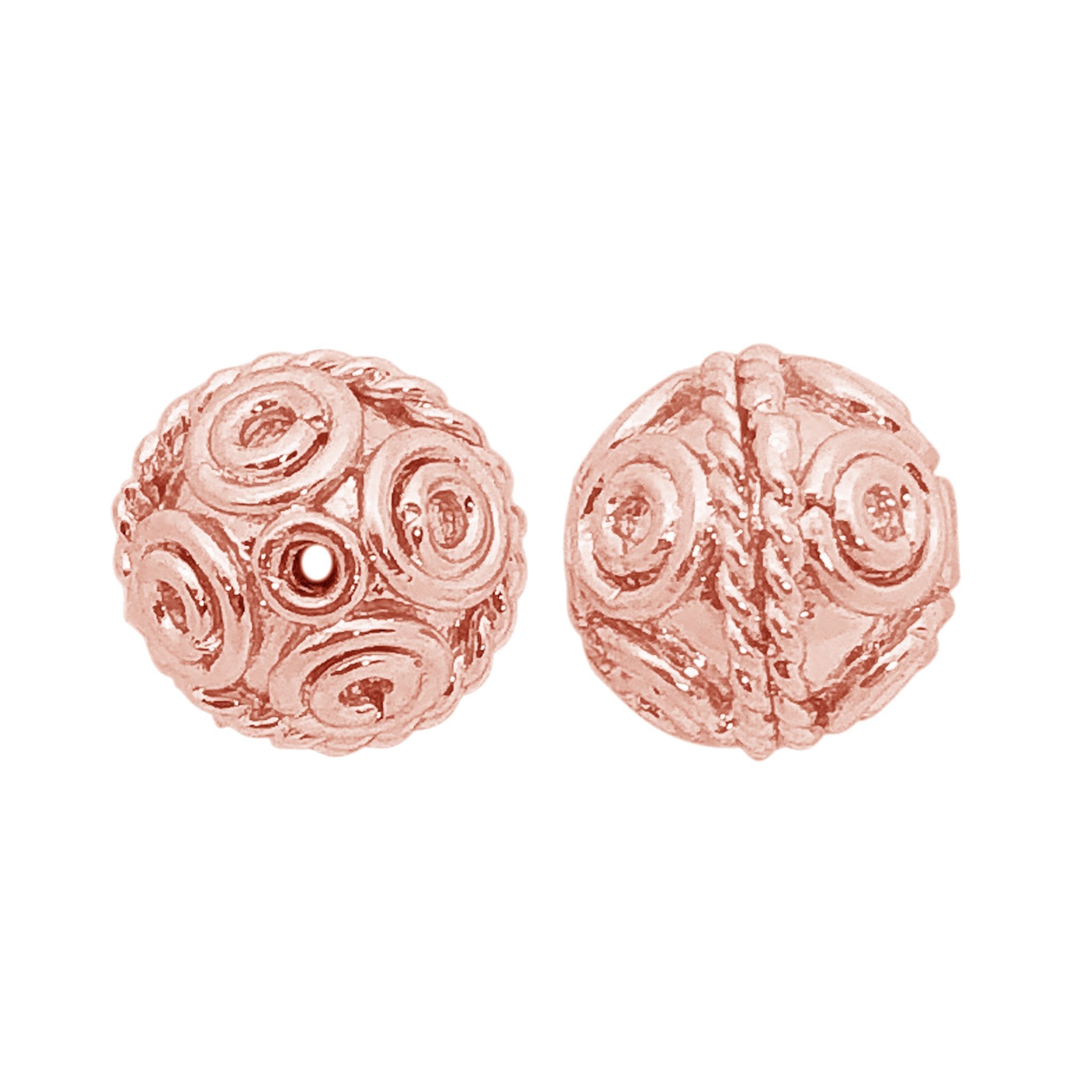 Rose gold spiral copper bead handcrafted in India with raised detailing and polished finish