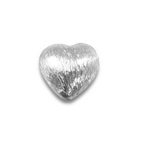 Elegant silver heart bead with textured finish, handcrafted in India using silver overlay over copper.