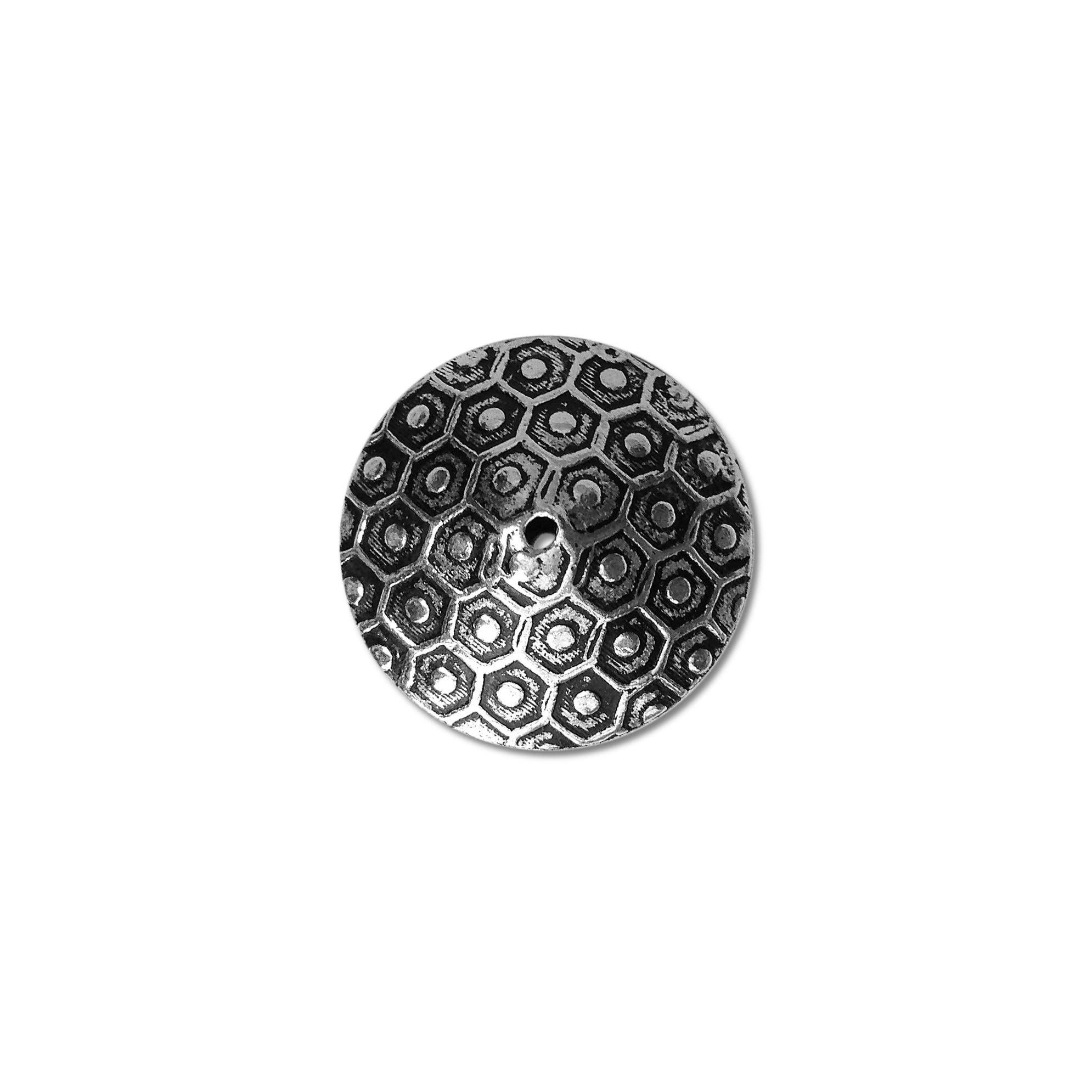 Silver bead cap from India with textured round design, handcrafted using silver overlay over copper for jewelry making.