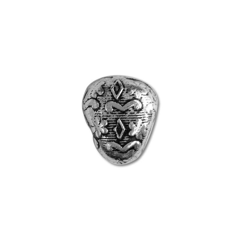 Silver tribal bead cap from India with textured artisan design, handcrafted using silver overlay over copper.