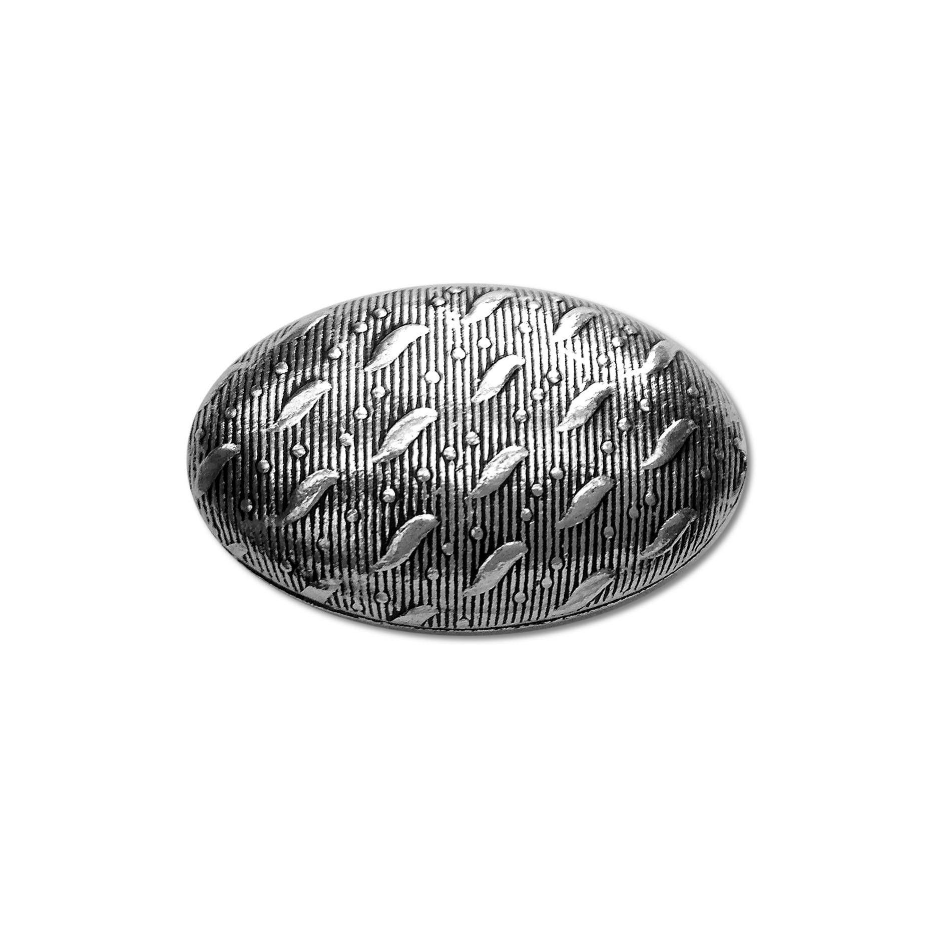 Silver oval dome bead cap from India with leaf and dot textured design, handcrafted using silver overlay over copper.