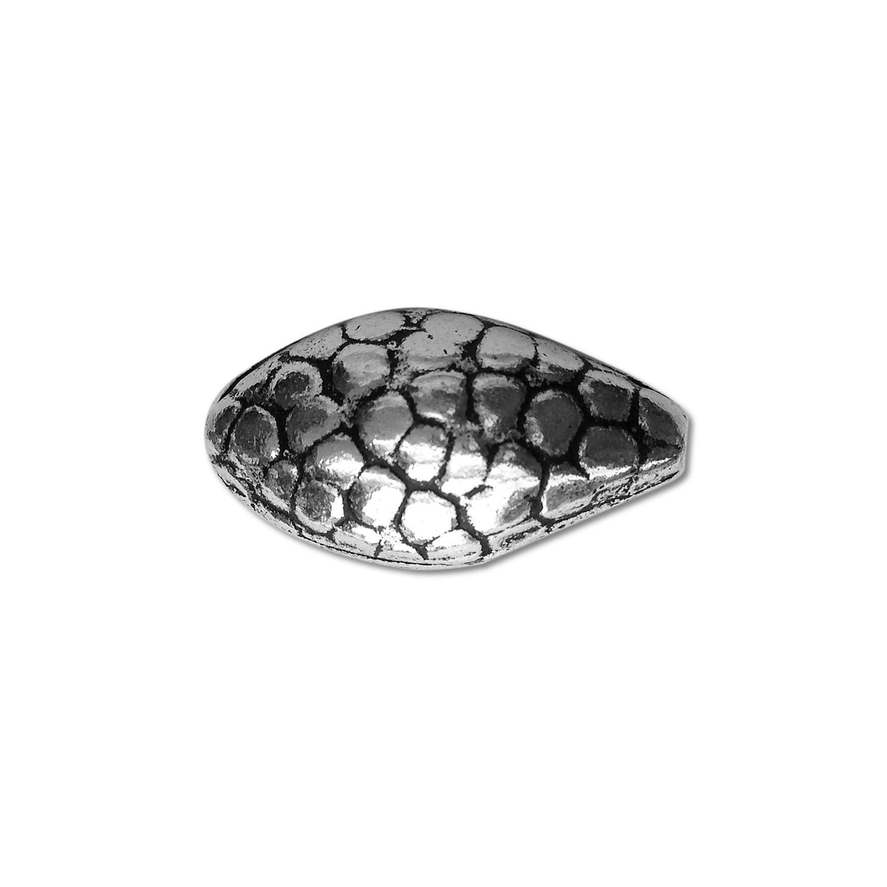 Silver oval bead cap from India with pebble textured design, handcrafted using silver overlay over copper.