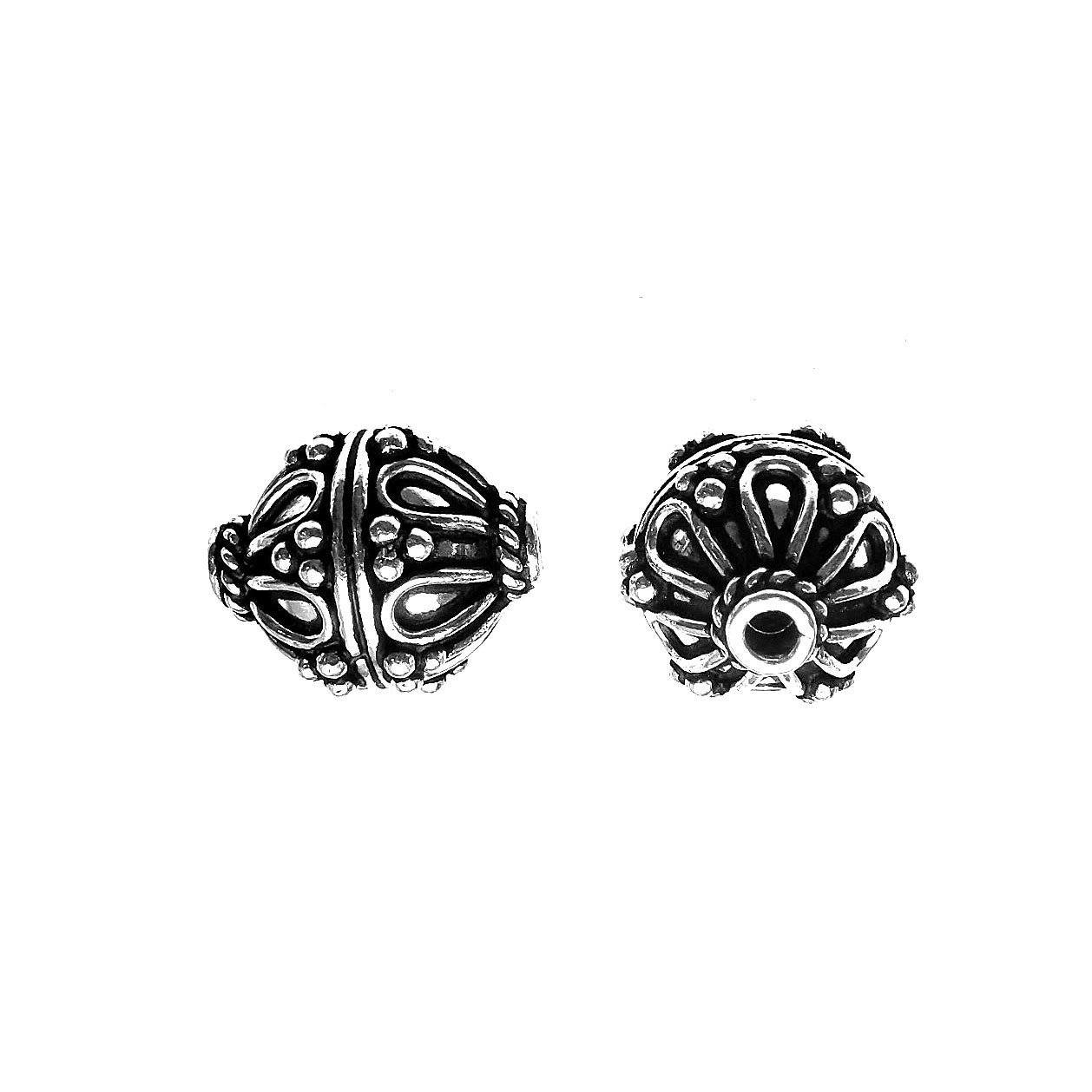 Petal pattern silver overlay over copper round bead handcrafted in India with dotted detailing