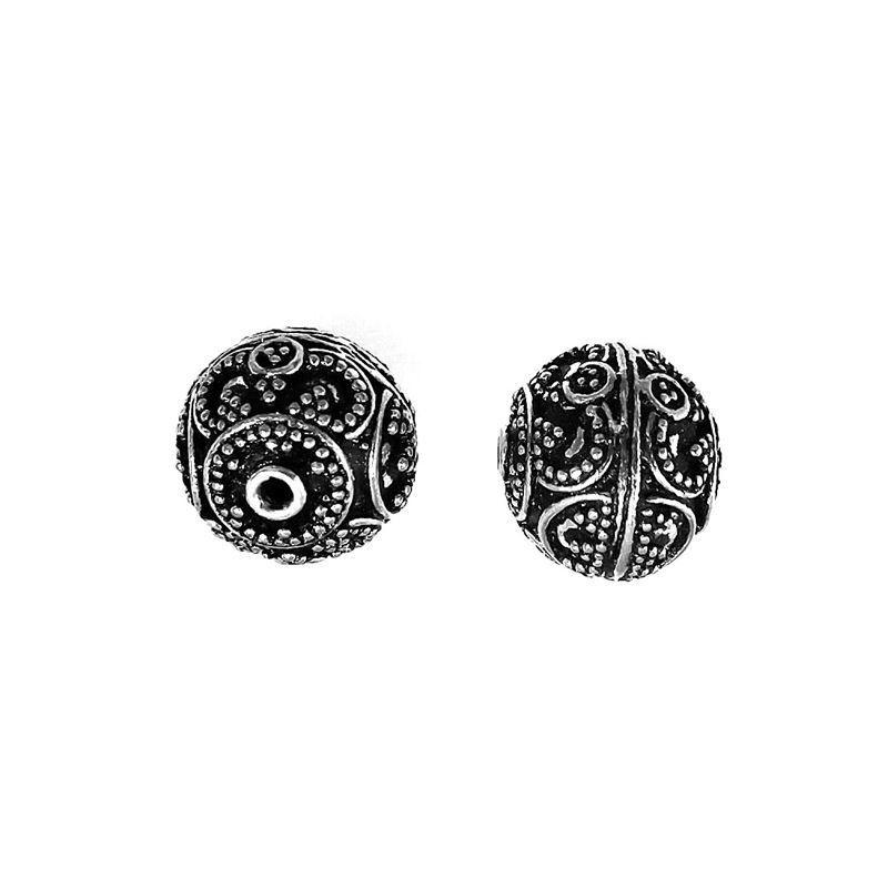 Granulated silver overlay over copper round bead handcrafted in India with dotted detailing