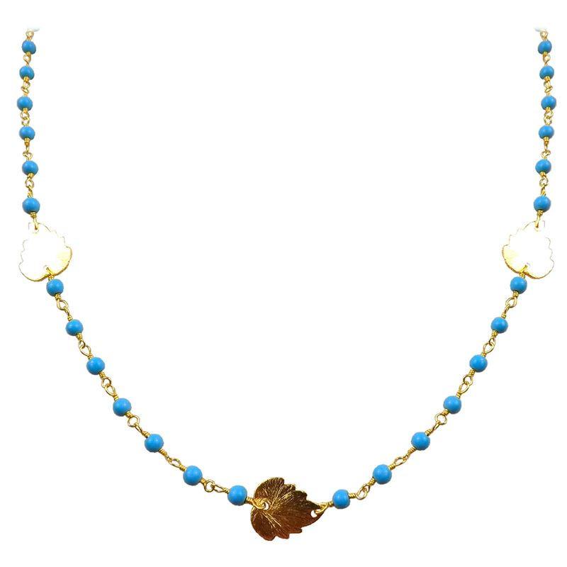 Elegant turquoise shell beaded necklace with leaf motif accents and smooth 18K Gold Overlay Over Copper designed for everyday and festive wear