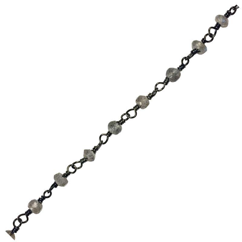 Oval link chain made with Rhodium Overlay Over Copper featuring Labradorite bead accents, smooth polished dark finish, and flexible length sold per foot for custom jewelry styling