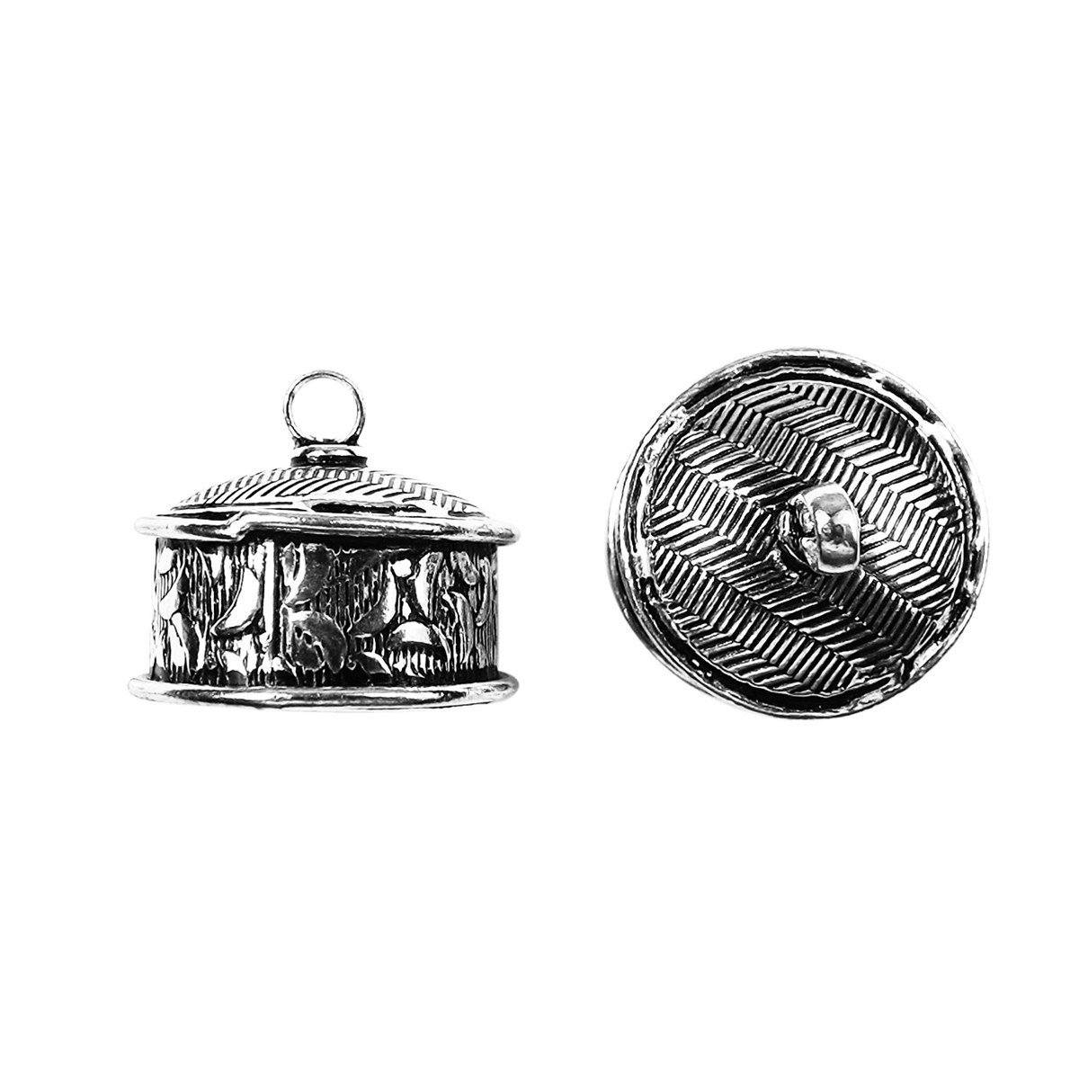 Handcrafted silver overlay over copper dome cap pendant from India with textured and geometric detailing