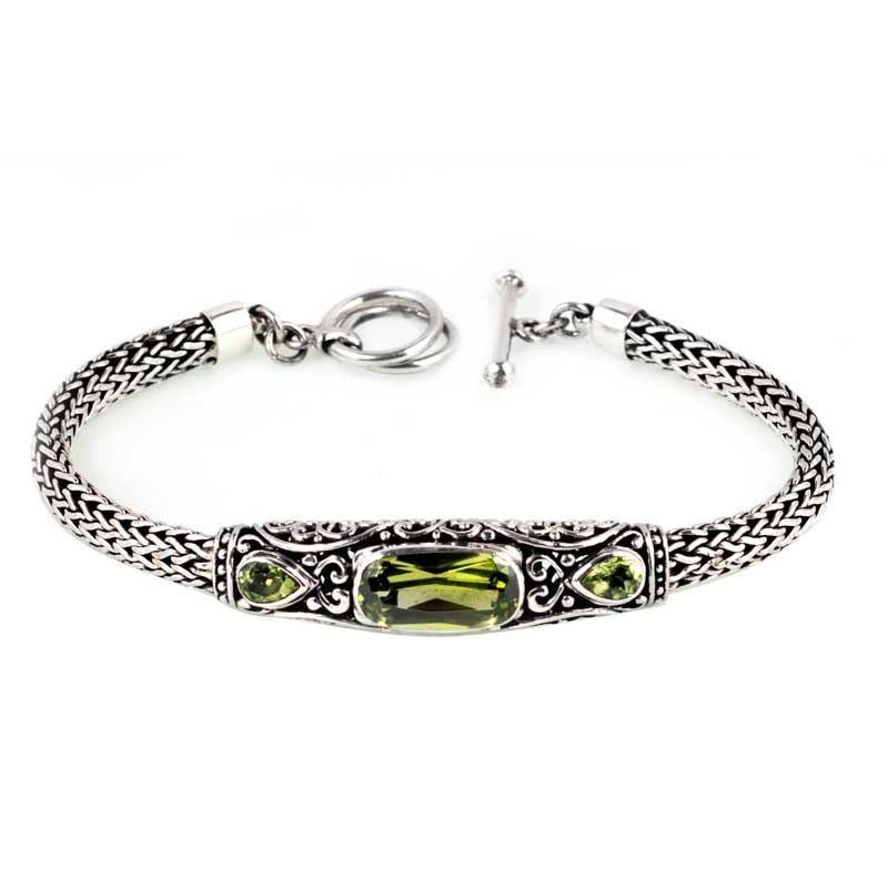 Sterling Silver Bracelet With Peridot Quartz Center-Bar And Bali Carved Accents