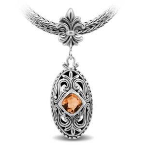Handcrafted Sterling Silver Oval Pendant With Citrine Quartz And Fleur-De-Lis Bail Detailing.