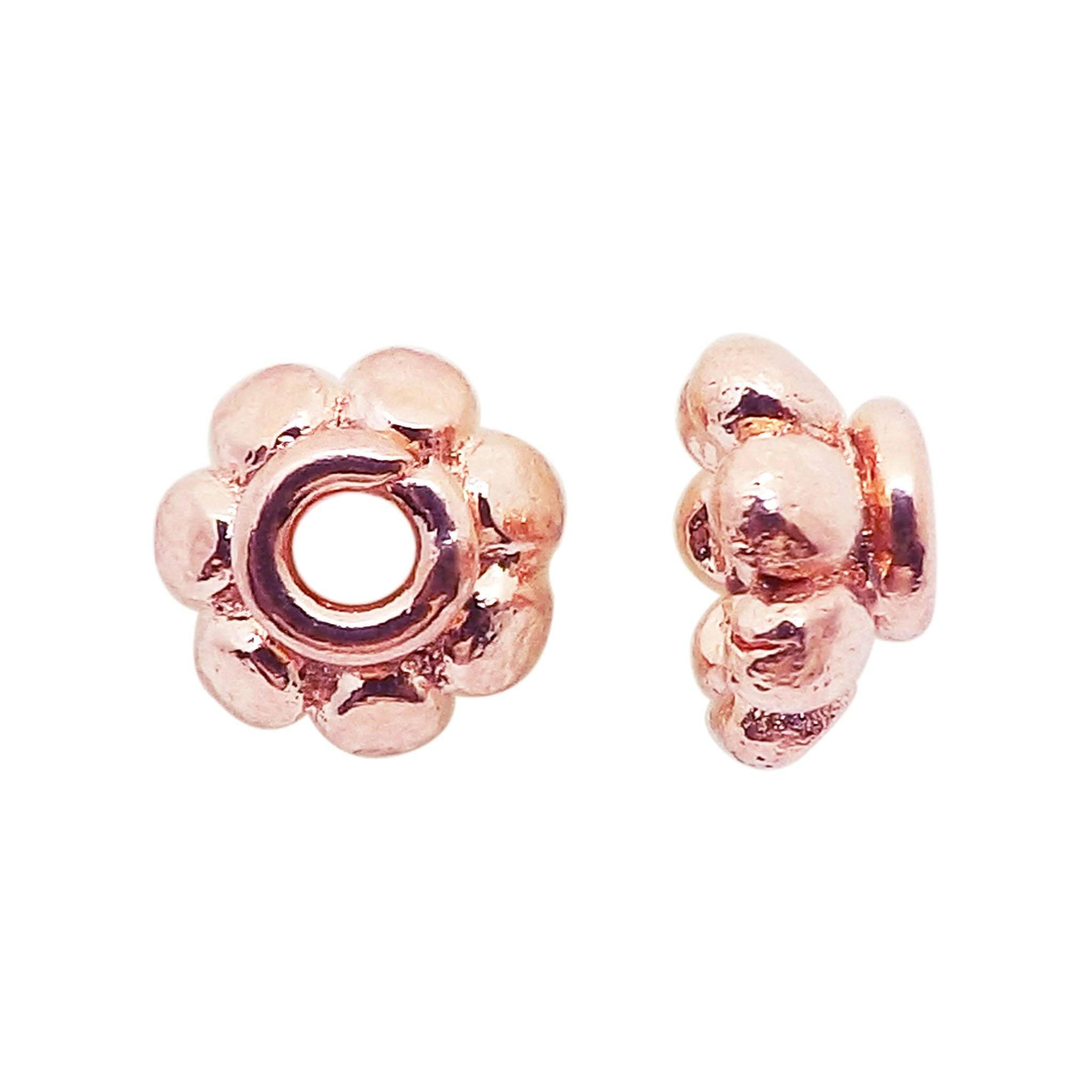 Rounded petal spacer beads in rose gold overlay over copper handcrafted in India for retail jewelry making