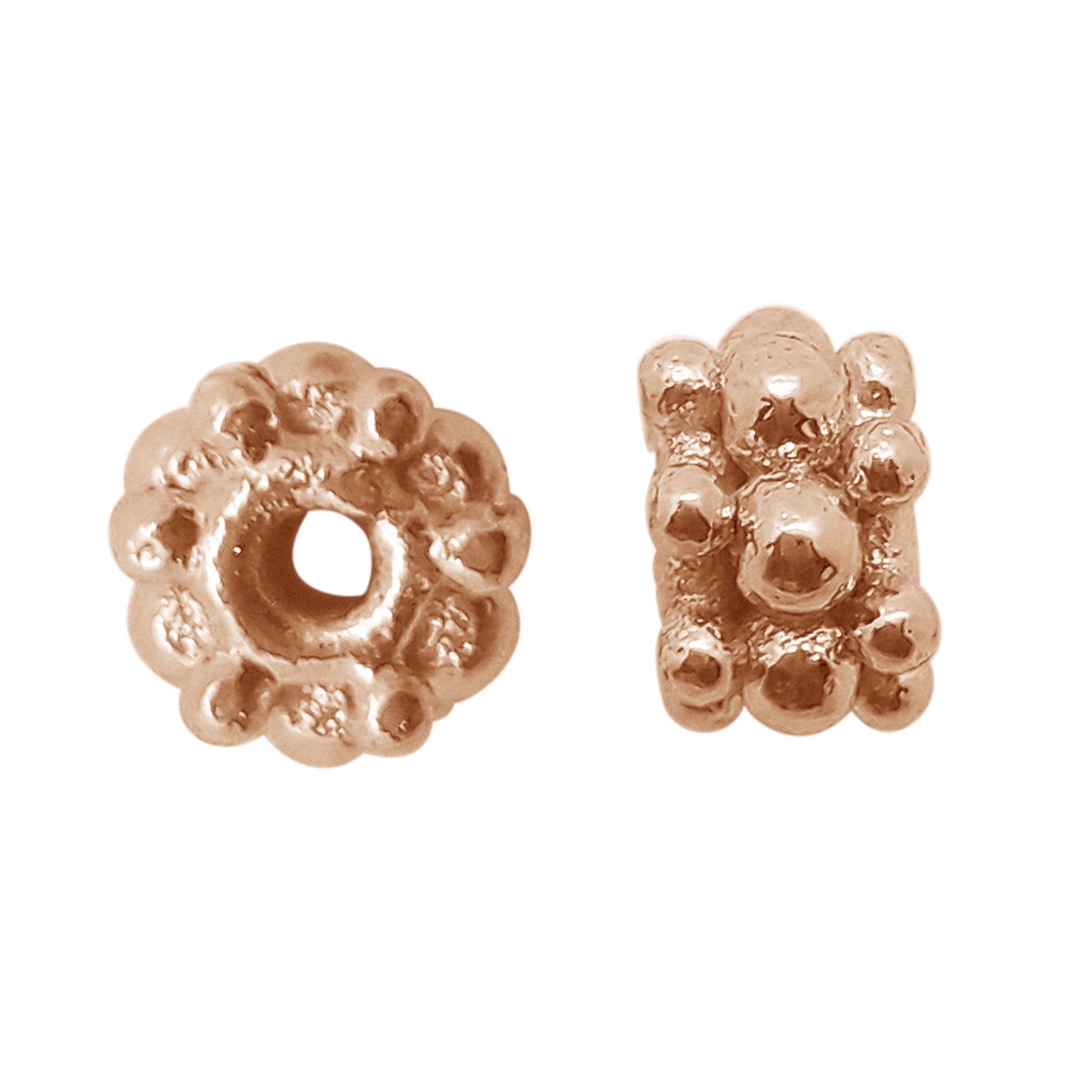 Handcrafted rose gold overlay over copper round spacer bead from India with textured Bali design
