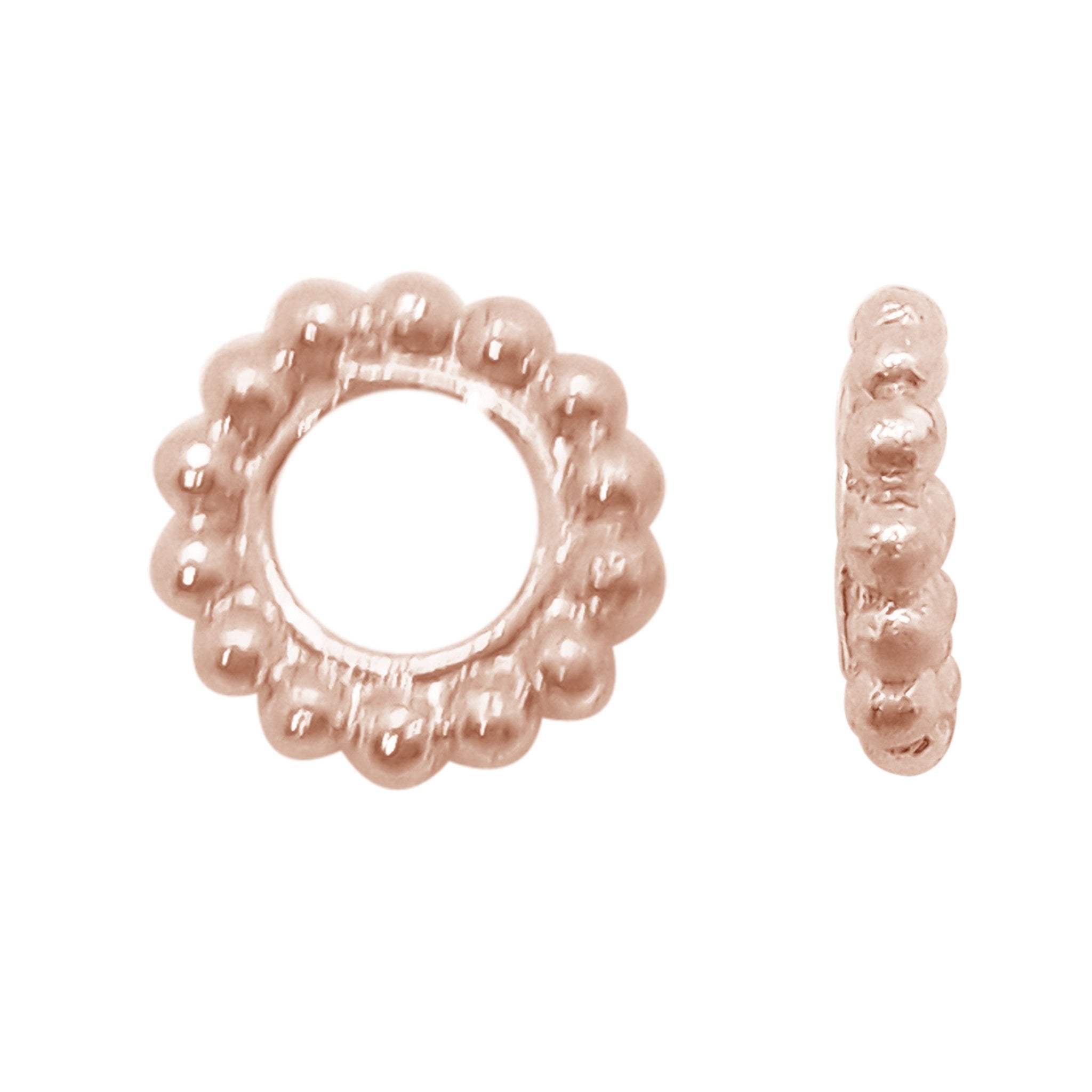 Handcrafted rose gold overlay spacer bead from India with polished rounded design