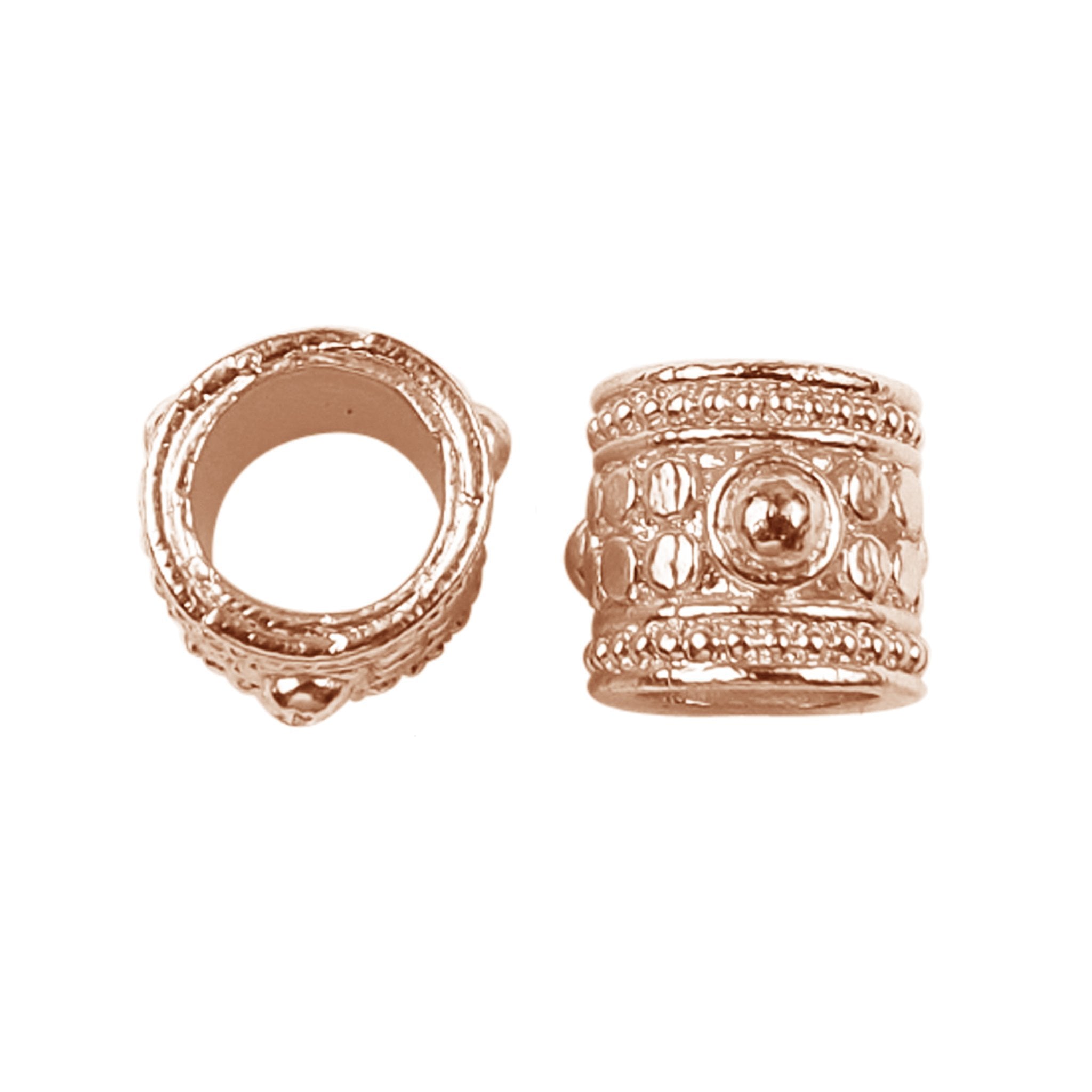 Decorative barrel spacer bead with rose gold overlay over copper, handcrafted in India for jewelry making