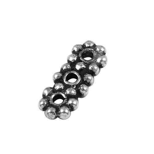 Handcrafted triple daisy spacer bead in silver overlay over copper with oxidized floral granulation.