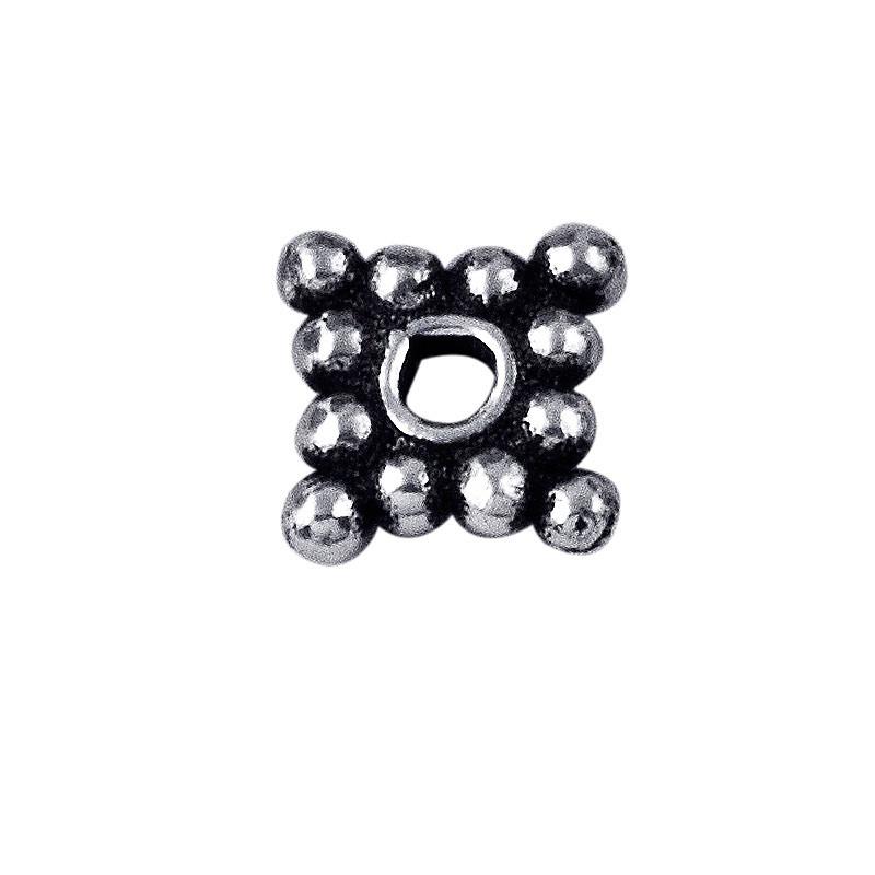 Silver overlay over copper bubble spacer beads handcrafted in India with cluster design and polished finish.