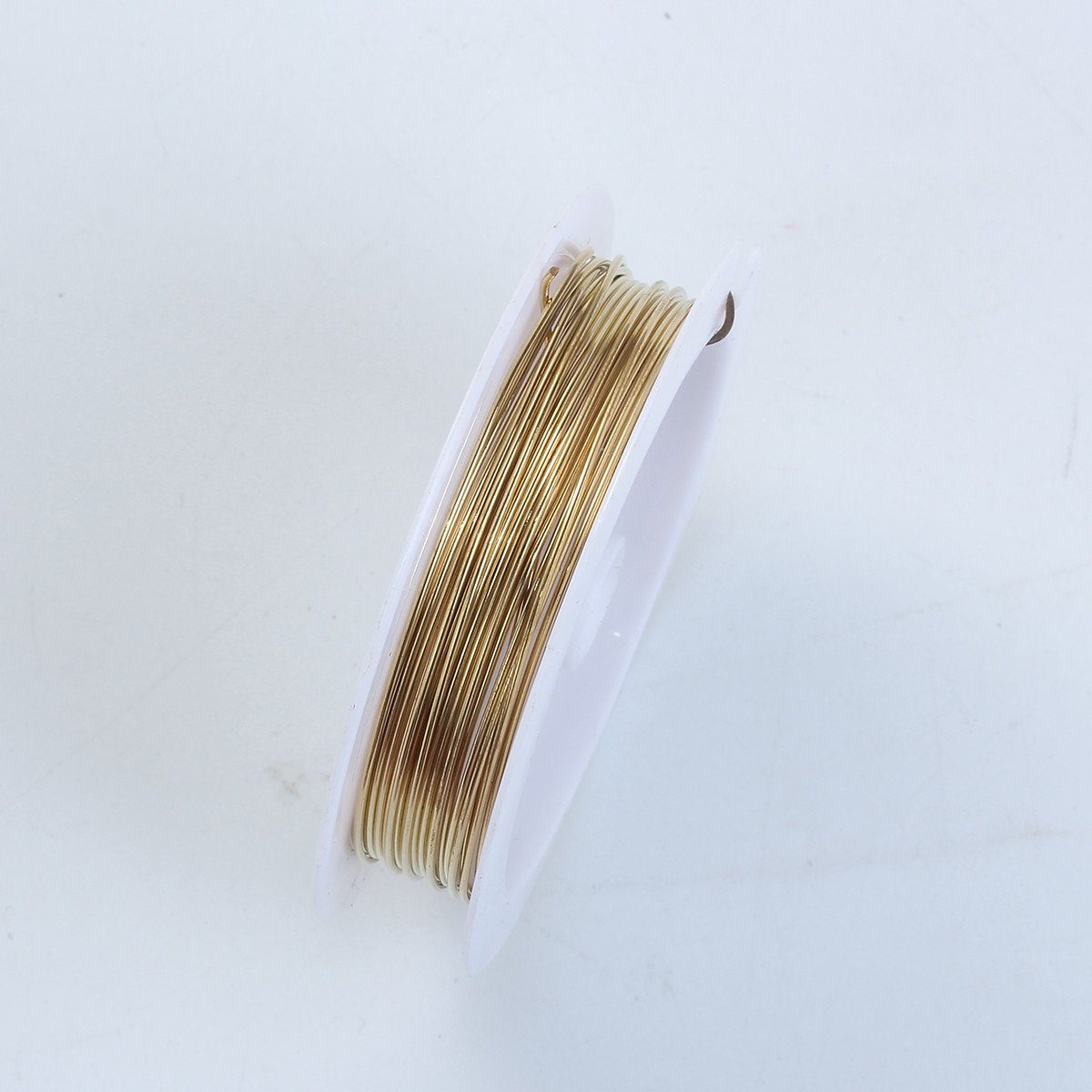 Durable gold wire from India made with 18K gold overlay over copper 20 gauge for jewelry making