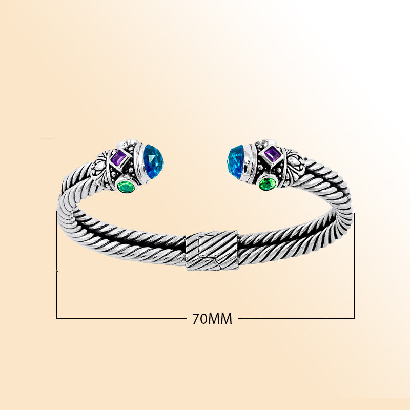 Handmade sterling silver Balinese cuff bangle with blue topaz, amethyst, and Peridot quartz gemstones