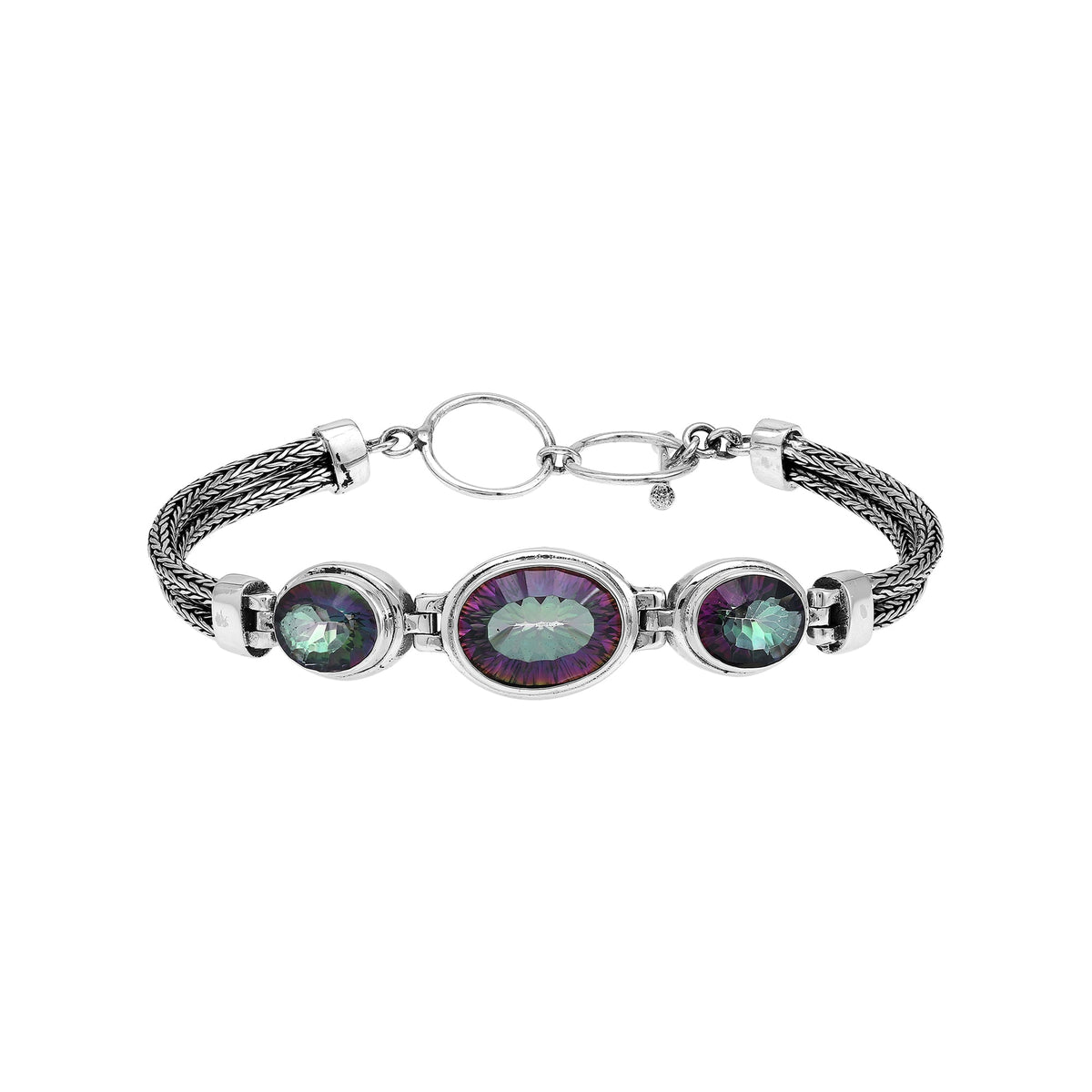 Handcrafted silver bracelet with mystic quartz stones in woven Bali design.