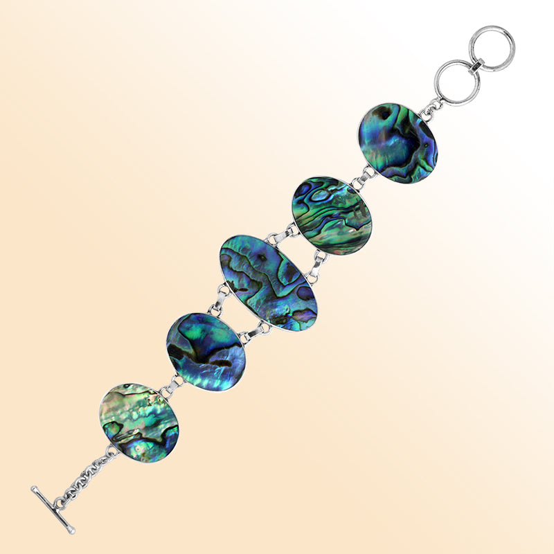 Handmade abalone shell and sterling silver bracelet with oval panels, ocean-inspired jewelry from Bali