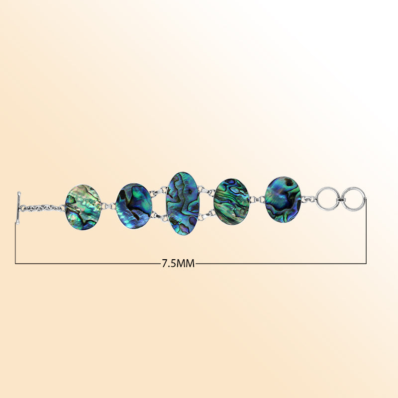 Handmade abalone shell and sterling silver bracelet with oval panels, ocean-inspired jewelry from Bali