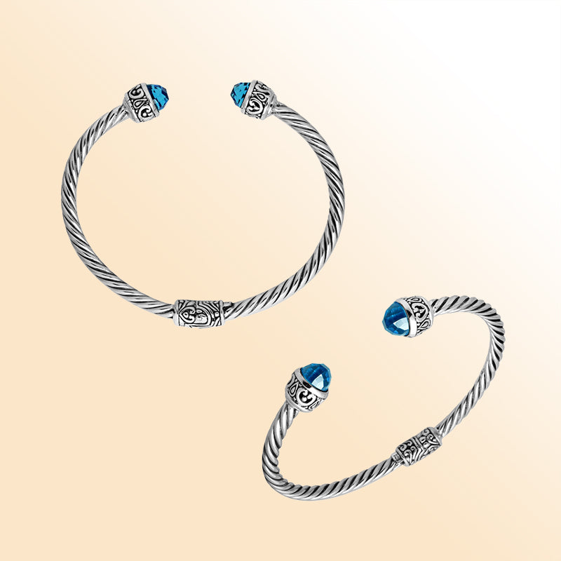 Sterling silver cuff bangle with faceted Blue Topaz Quartz stones and Balinese detailing, handmade in Bali.