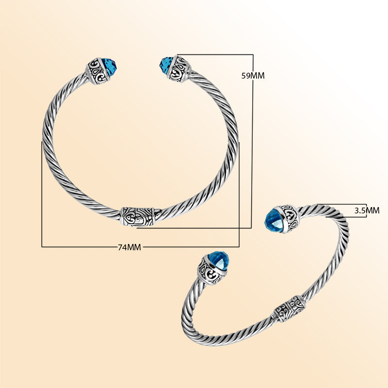 Sterling silver cuff bangle with faceted Blue Topaz Quartz stones and Balinese detailing, handmade in Bali.