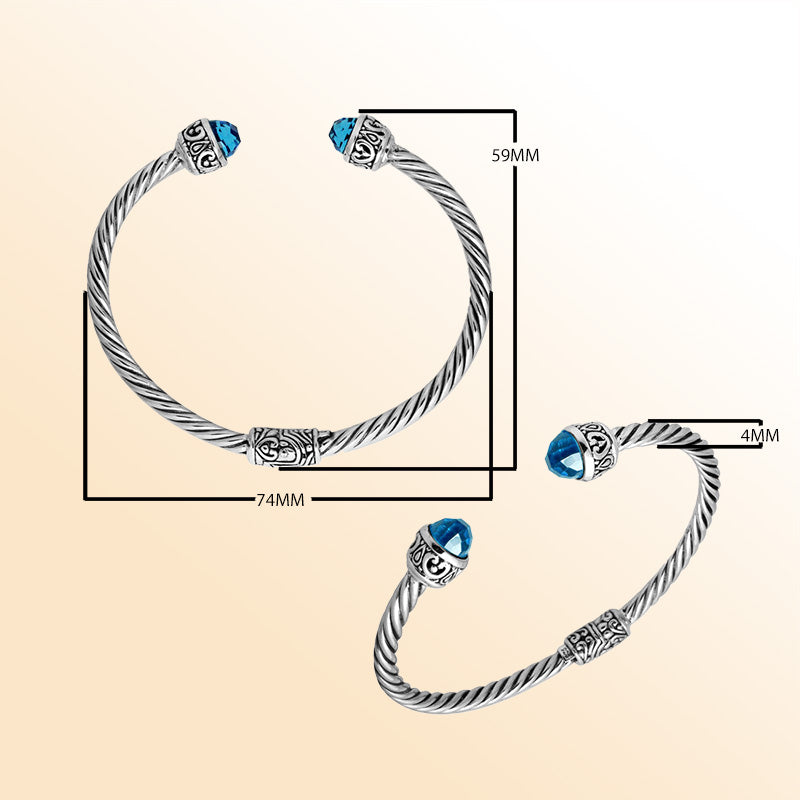Sterling silver cuff bangle with faceted Blue Topaz Quartz stones and Balinese detailing, handmade in Bali.