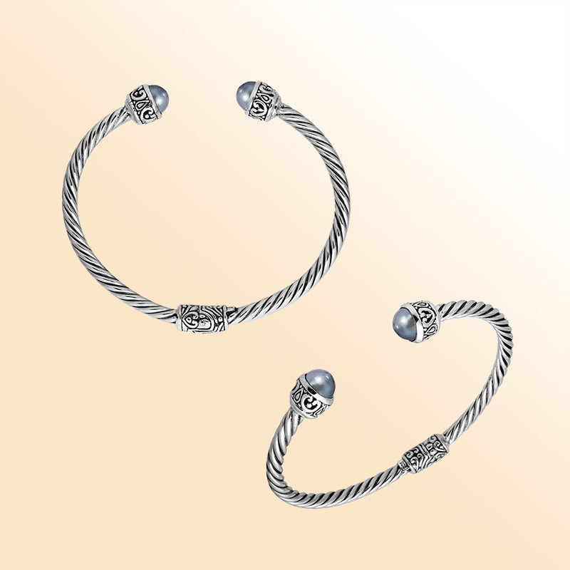 Sterling silver cuff bangle with luminous gray pearls and Balinese detailing, handmade in Bali.