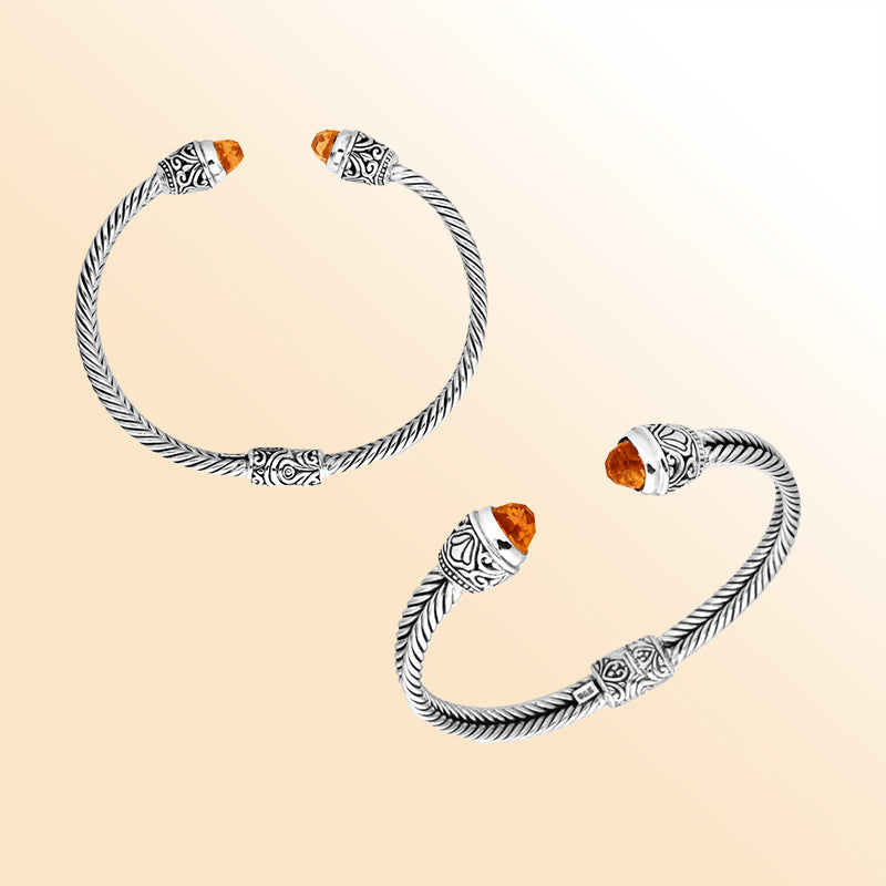 Handcrafted Bali sterling silver bangle featuring Citrine Quartz ends with ornate Balinese detailing, elegant open cuff design.