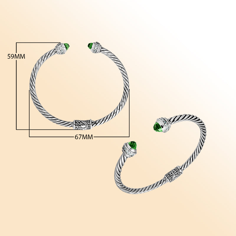 Handcrafted Bali sterling silver bangle with Green Quartz and Cubic Zirconia accents, rope-style design, adjustable open cuff.