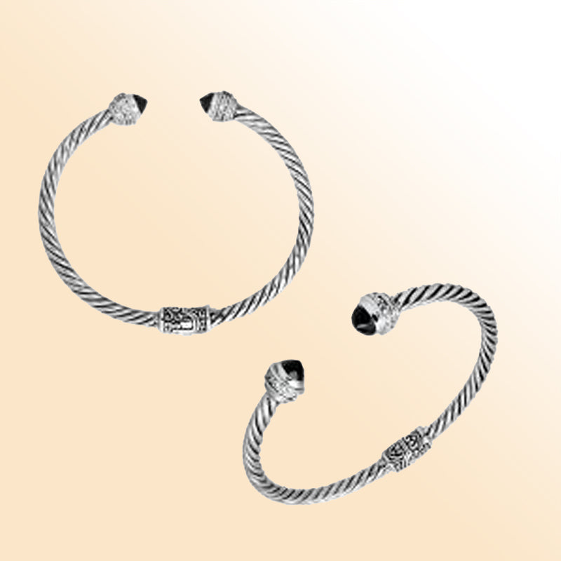 Handcrafted Bali sterling silver bangle featuring Black Onyx and Cubic Zirconia, rope-style design with ornate detailing.