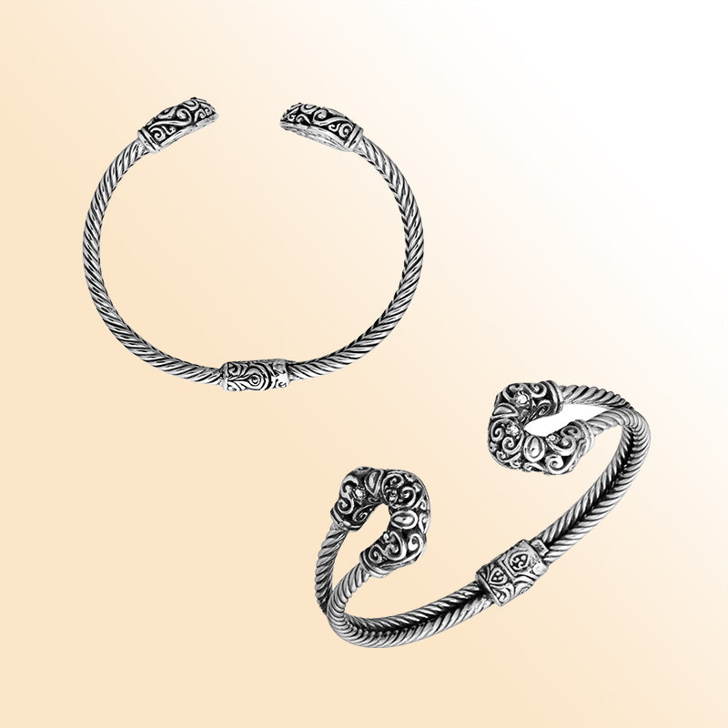 Handmade silver bangle with cubic zirconia ends and Balinese carved design