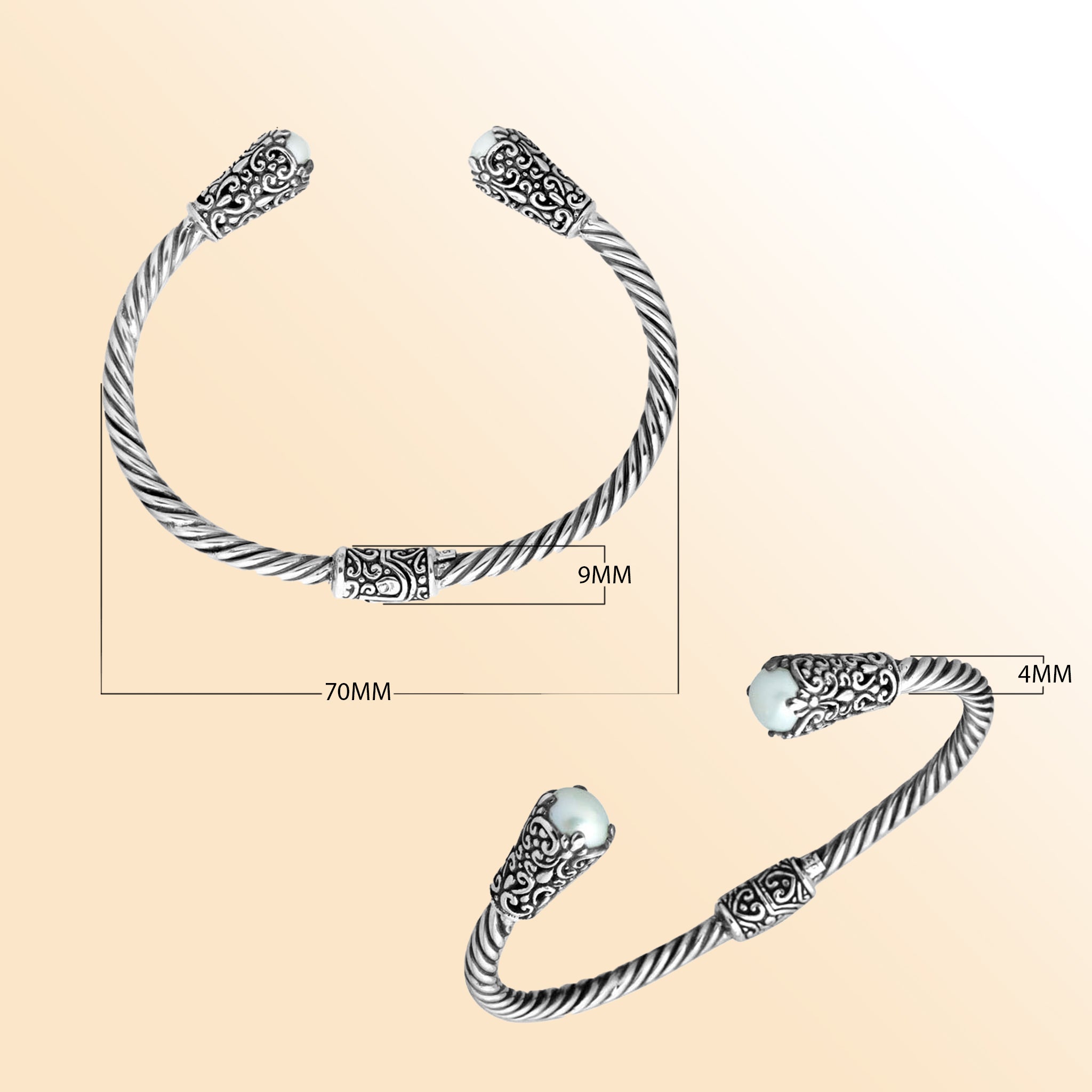 Handmade silver bangle with pearl ends and Balinese carved design
