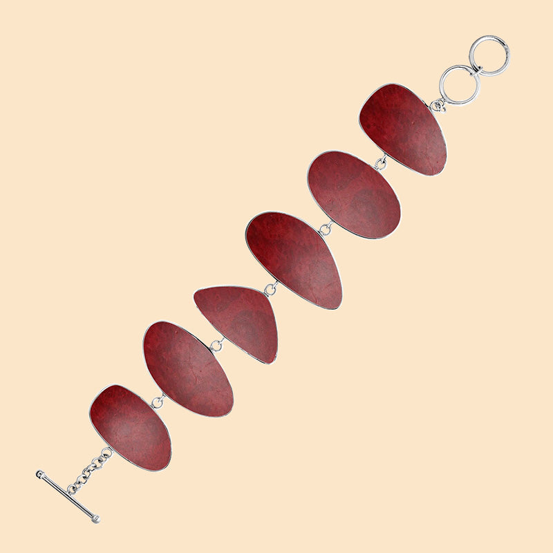 Sterling Silver bracelet with polished Red Coral panels, handcrafted in Bali.