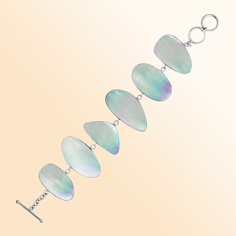 Sterling Silver bracelet with luminous Mother Of Pearl panels, handcrafted in Bali.