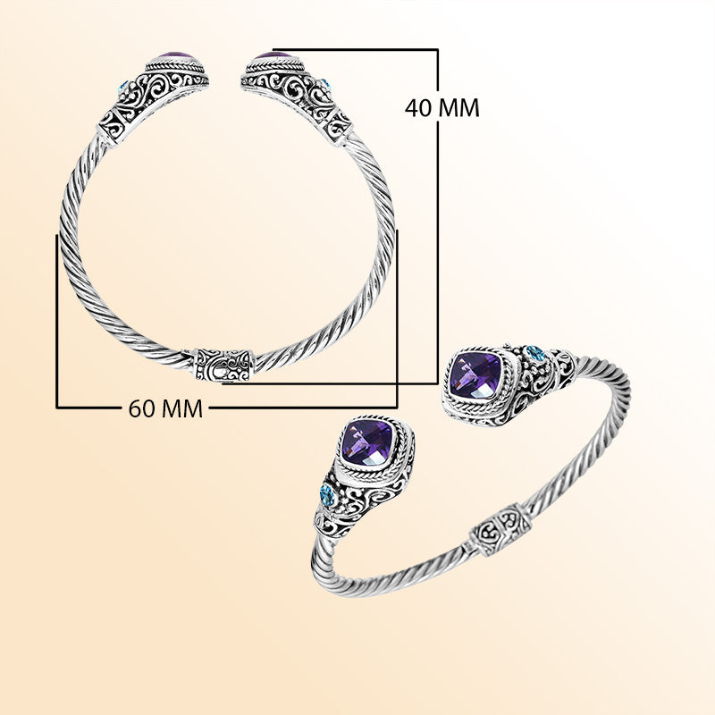 Handcrafted Sterling Silver bangle with Amethyst Quartz and Blue Topaz stones, artisan-made in Bali.