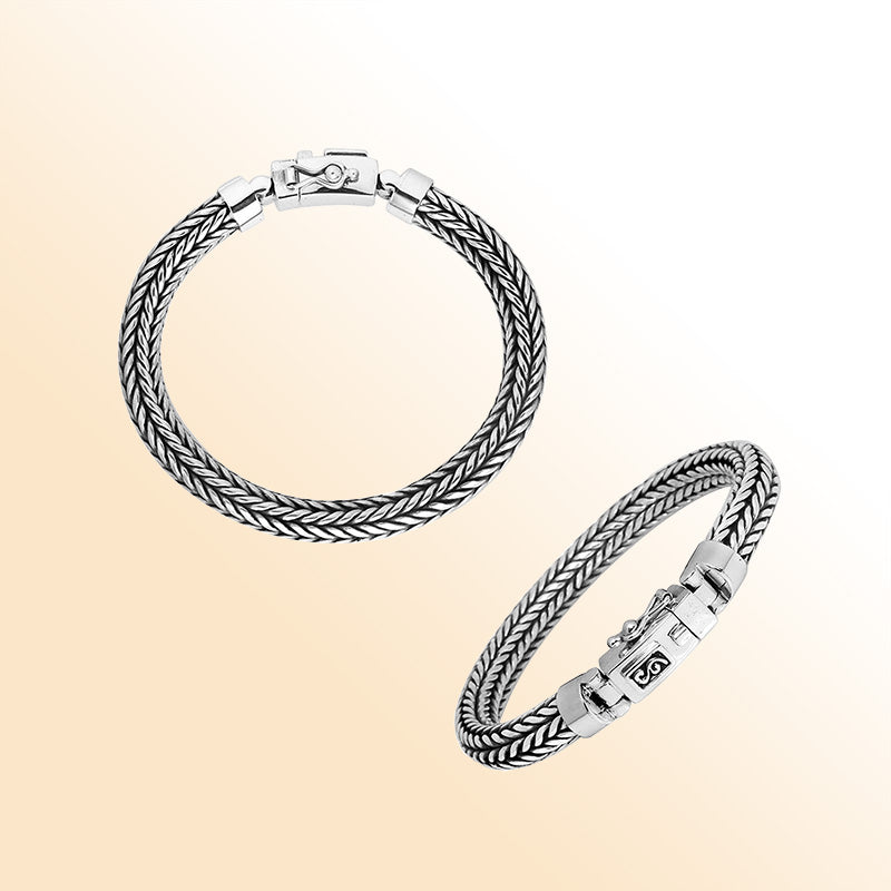 Product photo showing a 7MM 925 sterling silver woven rope bracelet from two angles with a secure latch clasp on a white background.