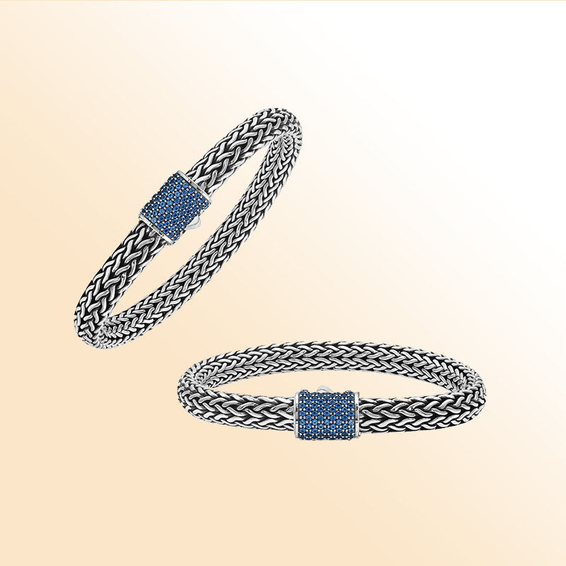 Sterling silver handcrafted Bali bracelet with Blue Topaz Quartz stone clasp and oxidized polish.