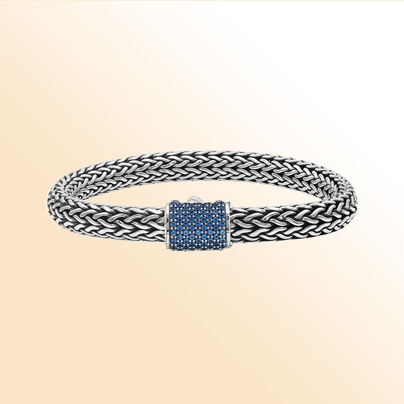 Sterling silver handcrafted Bali bracelet with Blue Topaz Quartz stone clasp and oxidized polish.