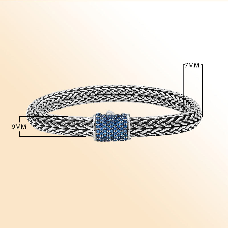 Sterling silver handcrafted Bali bracelet with Blue Topaz Quartz stone clasp and oxidized polish.