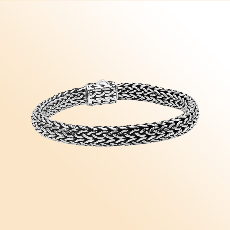 Sterling silver handcrafted Bali bracelet with Blue Topaz Quartz stone clasp and oxidized polish.