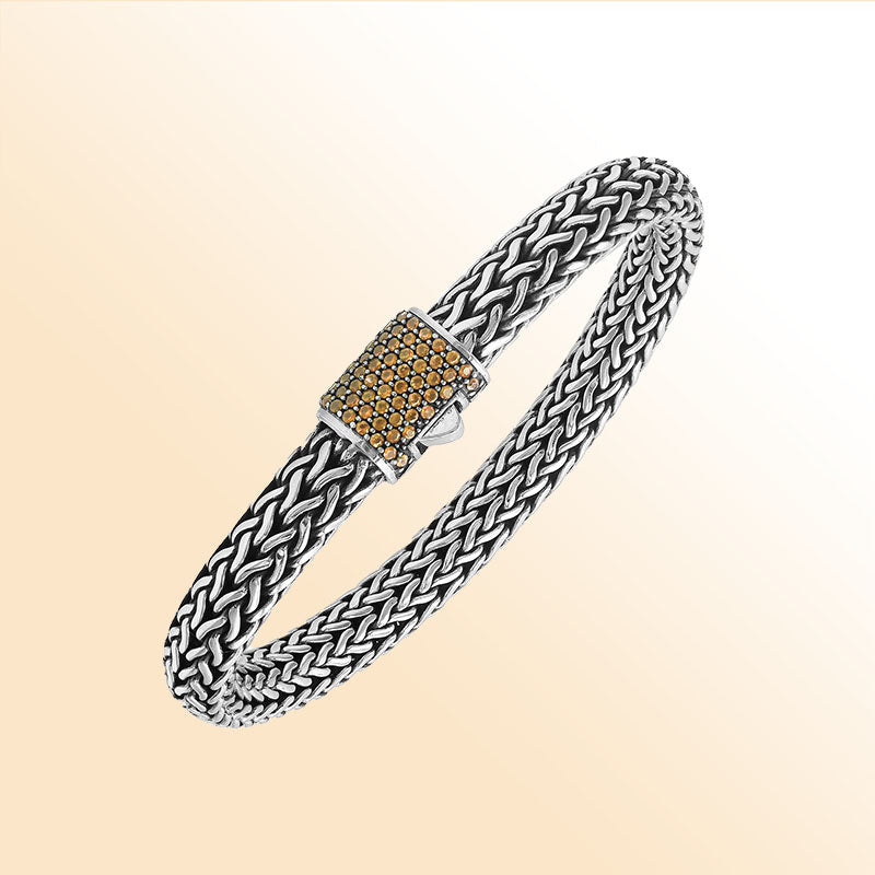 Sterling silver handcrafted Bali bracelet with Citrine Quartz stone clasp and oxidized detailing.