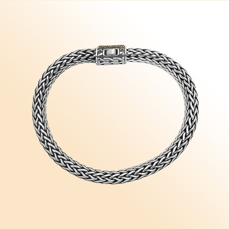 Sterling silver handcrafted Bali bracelet with Citrine Quartz stone clasp and oxidized detailing.