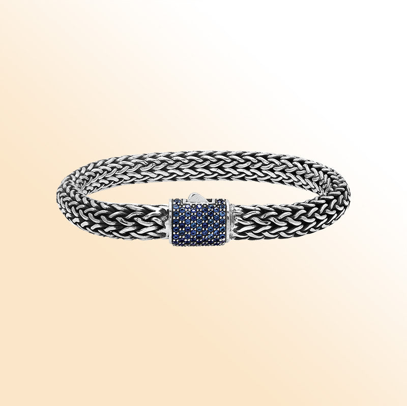 Sterling silver handcrafted Bali bracelet with Sapphire Quartz clasp and oxidized detailing.